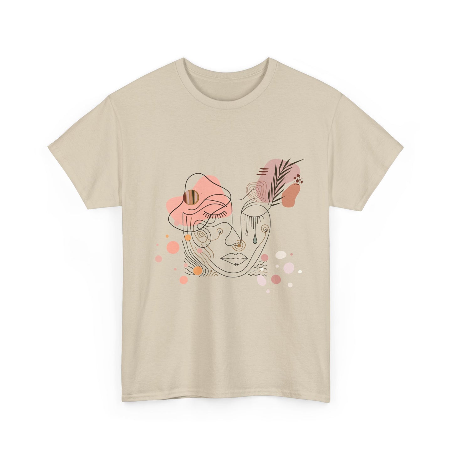 Unisex heavy cotton tee featuring a bold abstract face design with a bohemian artistic touch. A stylish and comfortable fashion piece perfect for casual gatherings, art events, and everyday wear.