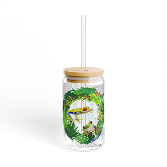 Eco-friendly 16oz tropical sipper glass with a bamboo lid, featuring a vibrant rainforest-inspired frog design—perfect for nature lovers and stylish drinkware collectors.







