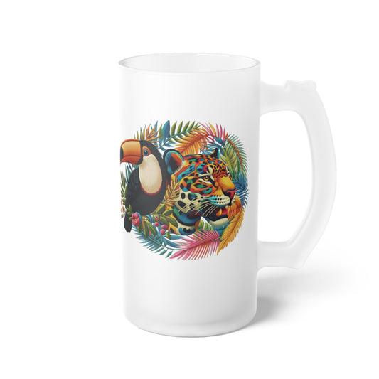 Eco-friendly frosted glass beer mug featuring artwork of a majestic jaguar and colorful toucan, perfect for tropical wildlife enthusiasts. Ideal for bars, man caves, or home settings, this premium mug combines nature-inspired design with sustainability. Enjoy your favorite beer in style while contributing to environmental protection.