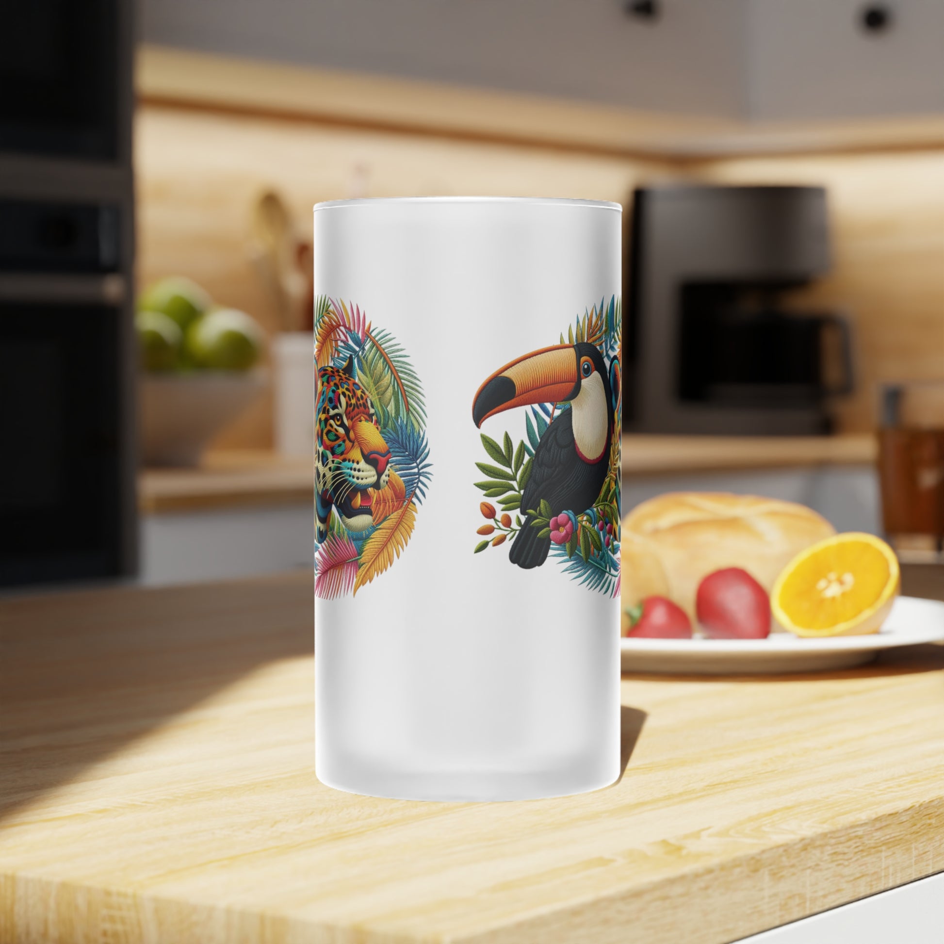 Eco-friendly frosted glass beer mug featuring artwork of a majestic jaguar and colorful toucan, perfect for tropical wildlife enthusiasts. Ideal for bars, man caves, or home settings, this premium mug combines nature-inspired design with sustainability. Enjoy your favorite beer in style while contributing to environmental protection.